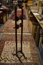 A floor standing mahogany wool winder.