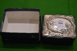 A silver mounted jewellery box.