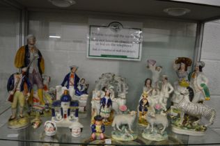 A quantity of Staffordshire figures etc.