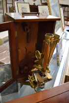 A good large binocular microscope by R & T Beck, London no: 4703, complete with mahogany case.