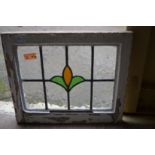 Ten small stained glass leaded light windows.