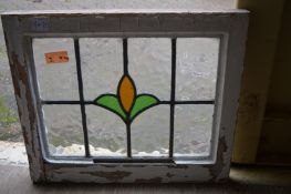 Ten small stained glass leaded light windows.