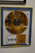 The Beatles, Help, a collectors series gold disc, framed and glazed.