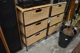 A pair of wicker three drawer chests.