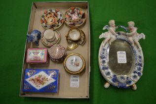 Porcelain collectables to include a miniature strut mirror, miniature cups and saucers etc.