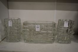 A set of three heavy moulded Bohemia glass vases.
