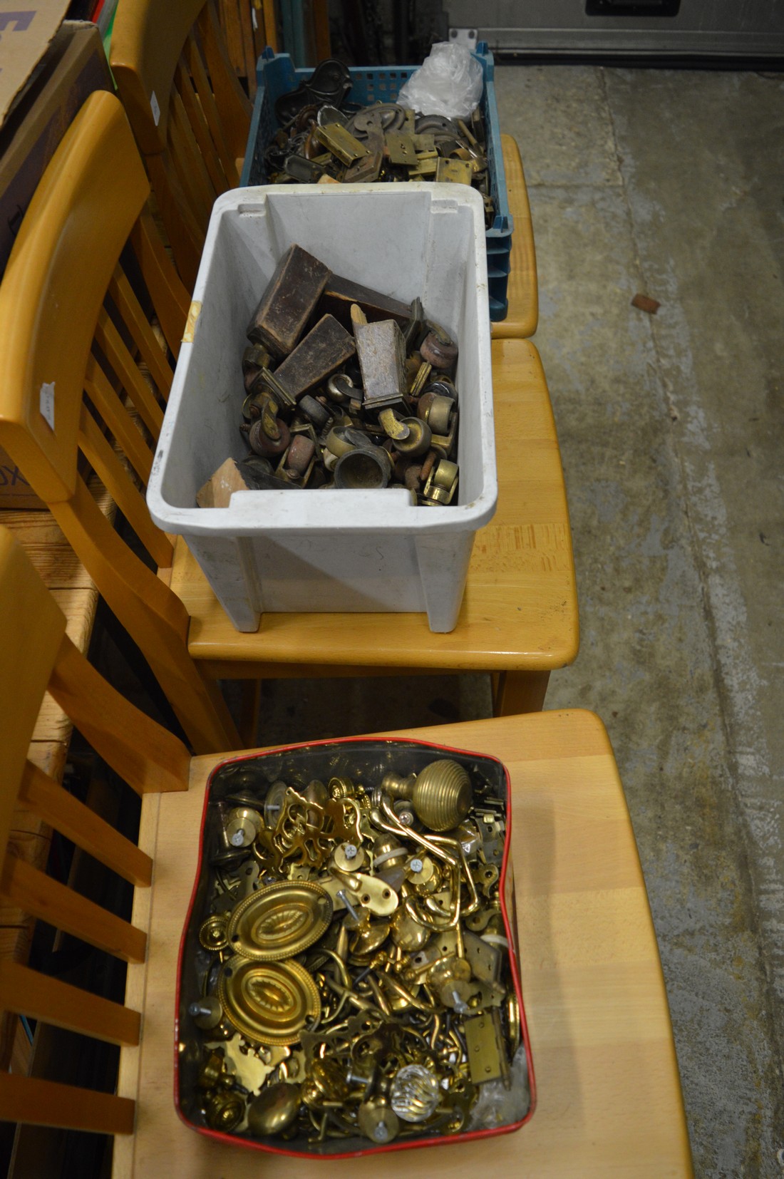 Quantity of furniture brass ware to include locks, handles, castors etc.