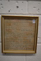 A small alphabet sampler dated 1838.