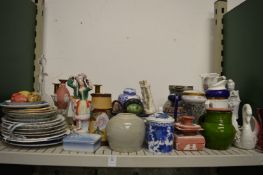 A shelf of decorative china, glassware etc.