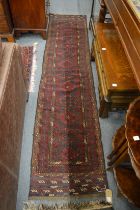 A good Persian runner with stylised geometric decoration 265cm x 60cm.