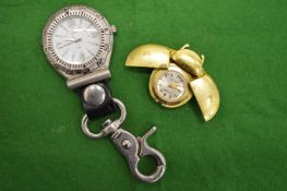 A fob watch and an unusual ladybird watch.