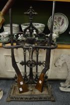 A Victorian cast iron stick stand.