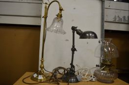 Two desk lamps and a cut glass lamp.