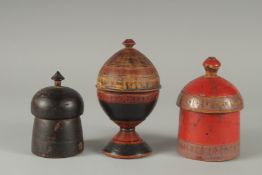 A COLLECTION OF THREE 19TH CENTURY INDIAN TURNED WOODEN CONTAINERS, tallest 16cm high, (3).