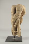 A FINE POSSIBLY 12TH CENTURY NORTH INDIAN CARVED YELLOW STONE TORSO OF A FEMALE DEITY, the torso