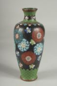 A JAPANESE BLACK GROUND CLOISONNE VASE, with decorative floral roundels and green scale pattern,