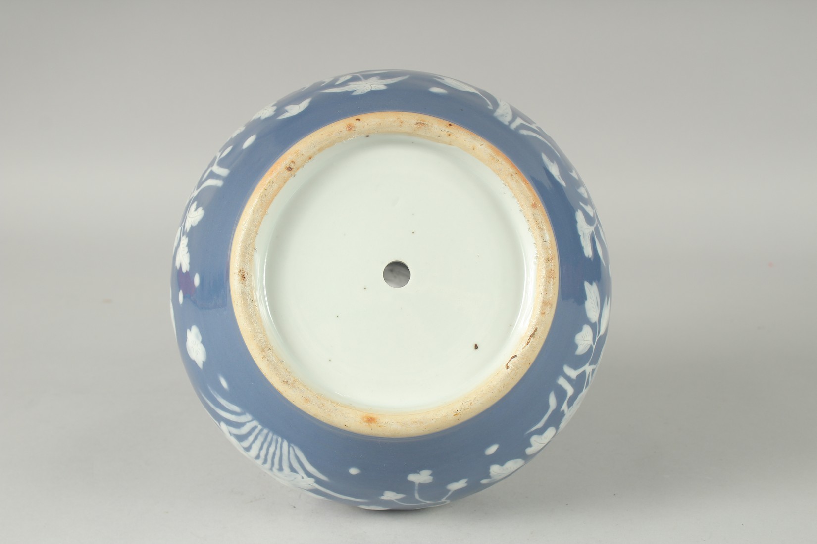 A CHINESE BLUE GROUND PORCELAIN VASE, with carved floral decoration in white, 34cm high. - Image 5 of 5