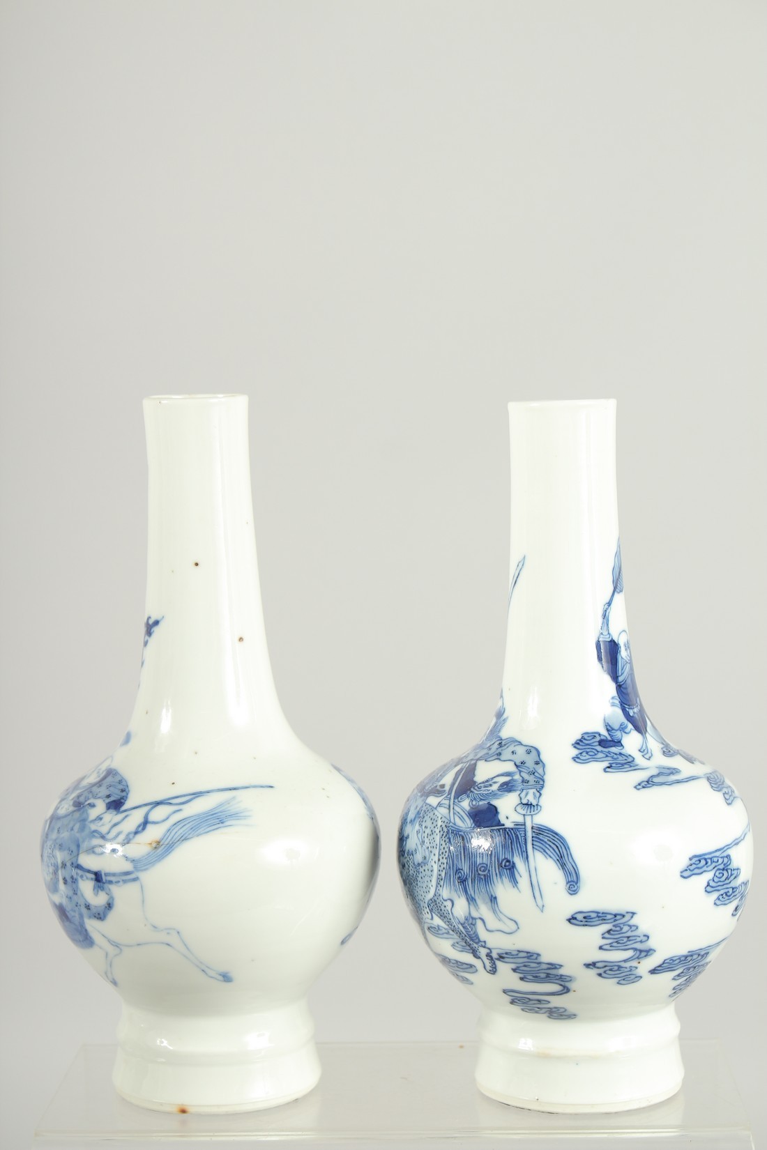 A FINE PAIR OF CHINESE BLUE AND WHITE PORCELAIN BOTTLE VASES, one painted with a warrior riding a - Image 2 of 8