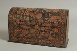 A KASHMIRI BOX, with hinged lid, decorated with flowers and fine gilt highlights, 25.5cm long.