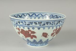 A CHINESE BLUE AND WHITE WITH UNDERGLAZE RED PORCELAIN BOWL, the base with six-character Ming mark -