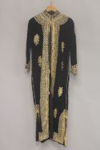 A MIDDLE EASTERN GILT THREAD EMBROIDERED HOUSE COAT.