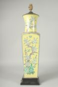 A LARGE CHINESE FAMILLE JAUNE PORCELAIN SQUARE-FORM VASE, converted to a lamp, painted with