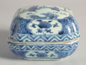 A CHINESE MING STYLE BLUE & WHITE PORCELAIN BOX & COVER, of square section with indented corners,