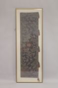 A LARGE CHINESE EMBROIDERED RUNNER, framed and glazed, textile 160cm x 45cm.
