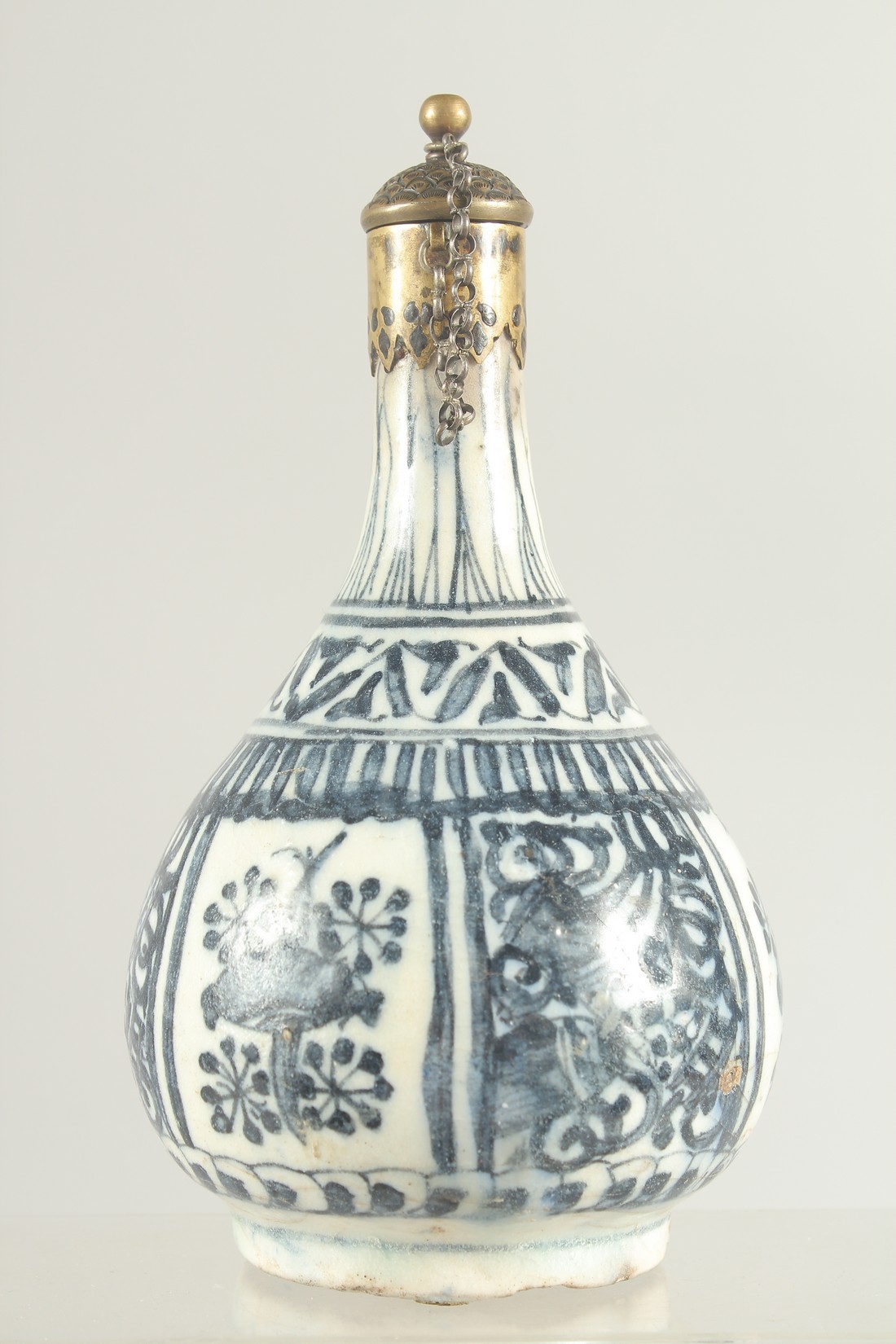 AN ISLAMIC BLUE AND WHITE PORCELAIN BOTTLE VASE, for the Chinese market, 19cm high. - Image 4 of 7