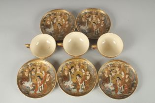 THREE JAPANESE SATSUMA CUPS AND SAUCERS, together with two spare saucer dishes, (8 pieces).