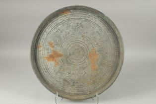 AN INDIAN ENGRAVED METAL TRAY, 51cm diameter.