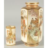 TWO FINE JAPANESE SATSUMA VASES, the larger painted with panels of scenes with various figures and