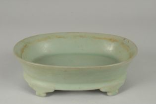 A CHINESE RU WARE OVAL-FORM PLANTER, raised on four legs, 22.5cm x 16.5cm.