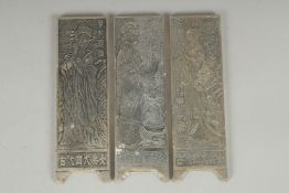 THREE CHINESE WEIGHTED METAL TABLETS / PAPERWEIGHTS., (3).