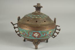 A CHINESE CHAMPLEVE ENAMEL CLOISONNE CENSER AND COVER, raised on tripod legs, 15cm high.