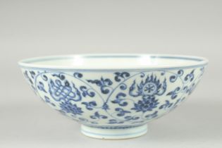 A CHINESE BLUE AND WHITE PORCELAIN LOTUS BOWL, base with six-character mark, 19cm diameter.
