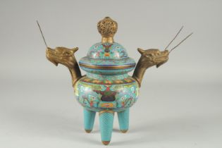 A FINE CHINESE BLUE GROUND CLOISONNE TRIPOD CENSER AND COVER, with twin dragon-head brass handles