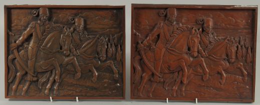 A PAIR OF OTTOMAN CARVED WOOD PLAQUES. 27cm x 35cm.