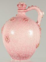 AN ISLAMIC MARKET PINK PORCELAIN VESSEL, with moulded decoration and gilt highlights. 20.5cm high.