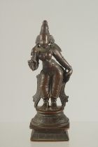 A FINE 17TH CENTURY SOUTH INDIAN BRONZE FIGURE OF FEMALE DEITY, 10cm high.