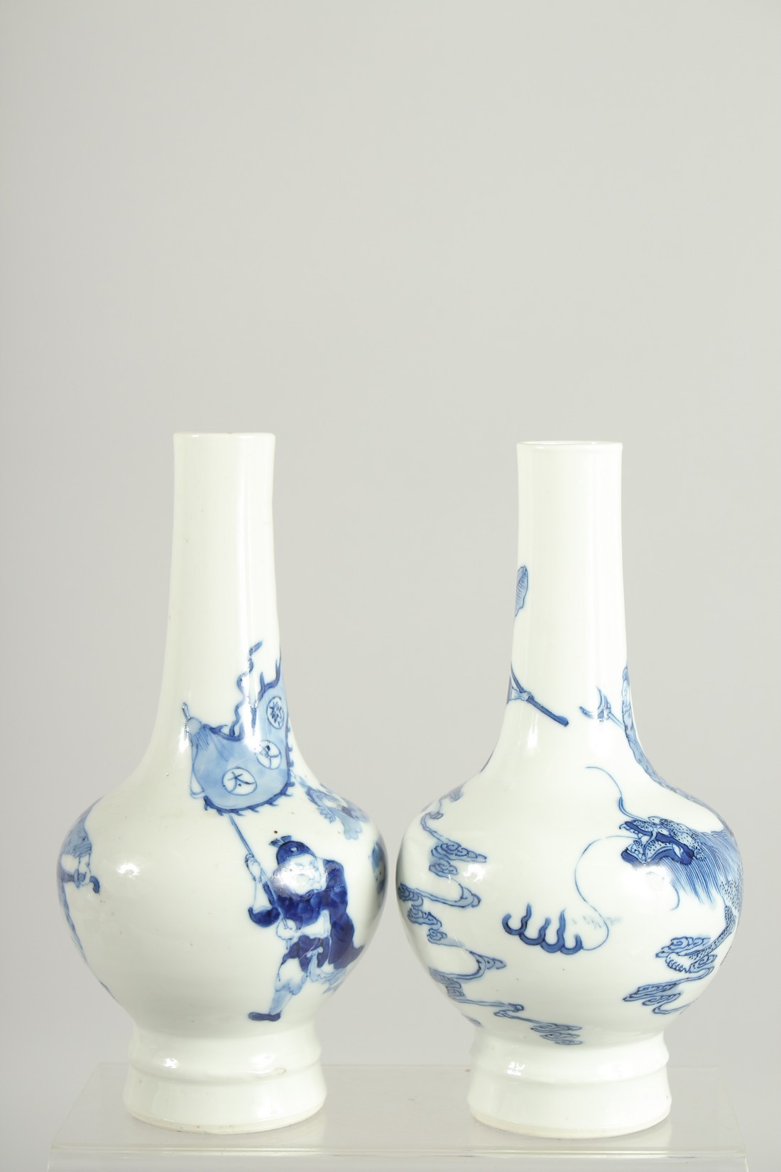 A FINE PAIR OF CHINESE BLUE AND WHITE PORCELAIN BOTTLE VASES, one painted with a warrior riding a - Image 4 of 8