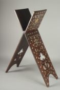 A SYRIAN MOTHER OF PEARL INLAID FOLDING QURAN STAND, with bone and abalone calligraphic roundels,