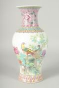 A CHINESE REPUBLIC PERIOD FAMILLE ROSE PORCELAIN BALUSTER VASE, painted with peacocks and flora, the