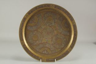 A CAIROWARE SILVER AND COPPER INLAID BRASS TRAY, 34cm diameter.