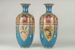 A LARGE PAIR OF LATE 19TH - EARLY 20TH CENTURY JAPANESE CLOISONNE VASES, decorated with panels of