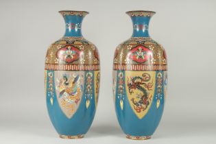 A LARGE PAIR OF LATE 19TH - EARLY 20TH CENTURY JAPANESE CLOISONNE VASES, decorated with panels of