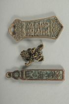 THREE CHINESE BRONZE ORNAMENTS.