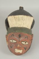 A PAINTED YORUBA HELMET.