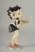 A PAINTED CAST IRON BETTY BOOP. 11ins high.