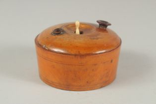 A MINIATURE WOODEN CASED ROULETTE WHEEL 4ins diameter.